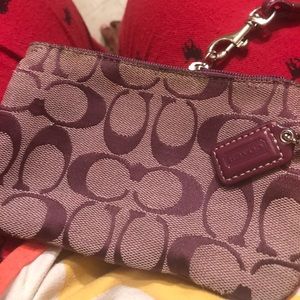 Coach wristlet in purple